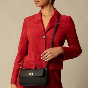 Bandolier Taylor Bag
CROSSBODY AND SHOULDER BAG IN BLACK/GOLD